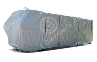 A picture of a RV Van covered in a plain sheet